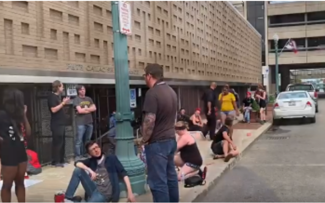 Protest Group Airs Grievances on Sidewalk in Front of CPD Station